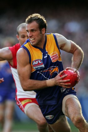 Chris Judd runs in his West Coast days.