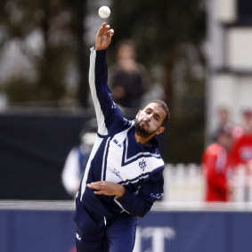 Flight and fight: Fawad Ahmed in action for Victoria at Junction Oval in St Kilda.