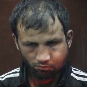 Shamsidin Faridunia appeared in court with a swollen jaw.