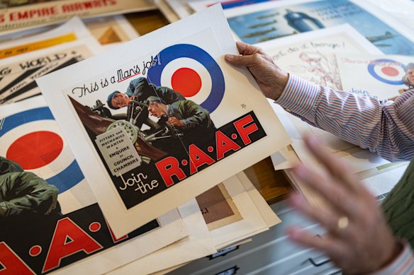  Josef Lebovic, of the Josef Lebovic Gallery, sifts through posters that he has collected for over 50 years. 