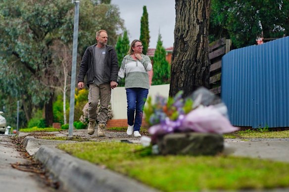 Jean visiting the scene of the crash on Friday with her partner Paul Alford.