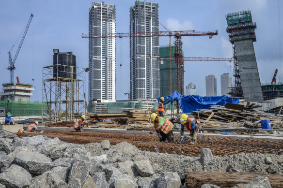 Workers prepare reinforcing steel as part of a Chinese Belt and Road Inititative in South Korea.