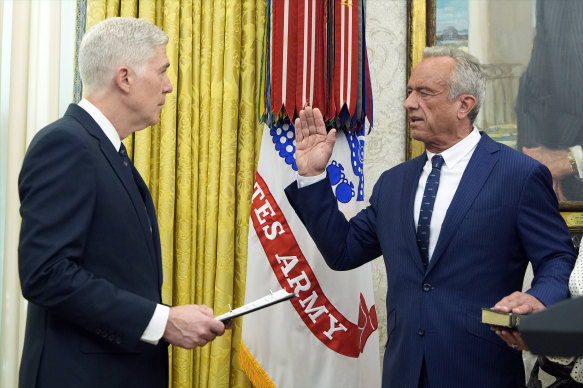 Former independent presidential candidate Robert F. Kennedy Jr is sworn in as US health secretary.