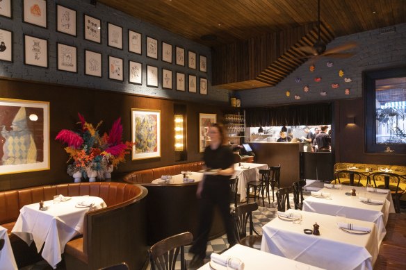 Staff prepare the dining room for action at Poodle Bar &amp; Bistro