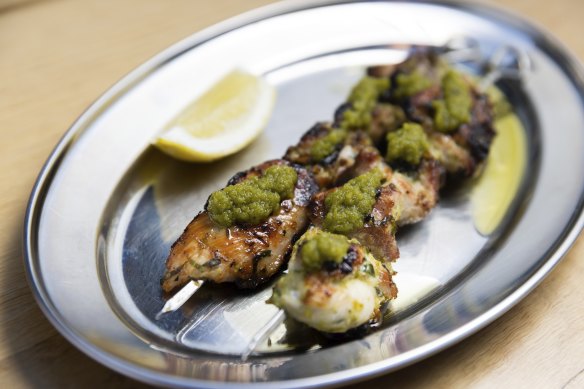 Chargrilled chicken skewers topped with oregano and fermented chilli sauce.