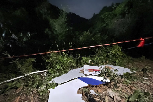 Debris seen at the crash site in Guangxi. 