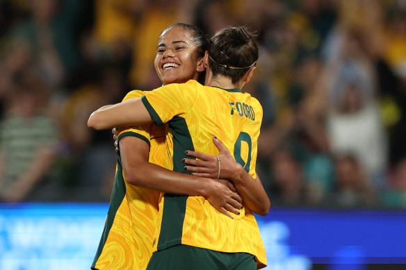 Mary Fowler hugs Cailtin Foord after Fowler’s goal against Chinese Taipei.