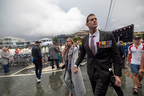 Ben Roberts-Smith and his partner Sarah Matulin attending a dawn service in Currumbin, Queensland, last month.