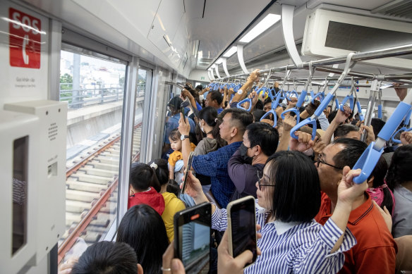 Passengers ride for free during the launch of Ho Chi Minh City’s first metro line. 