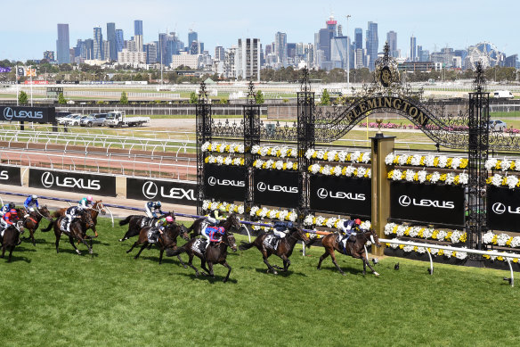 Irish thoroughbred Twilight Payment, ridden by Jye McNeil, wins the Melbourne Cup in 2020.