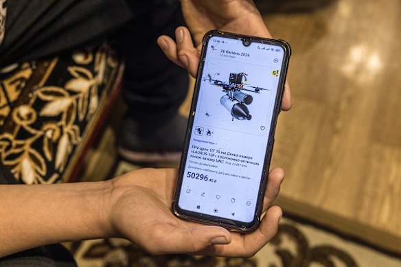 Anatolii displays an image of an FPV drone similar to the one he disabled.