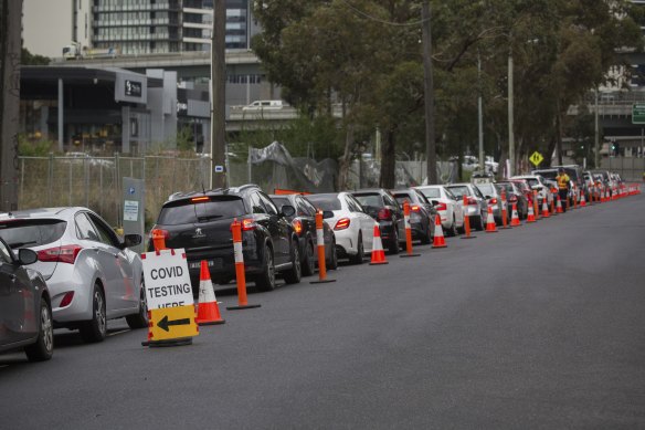 Hundreds of cars were lined up to get a COVID-19 test on Normanby Street, South Melbourne, on Wednesday.