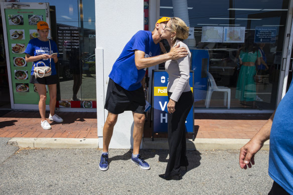 Churchlands candidate Basil Zempilas greets Libby Mettam at the Scarborough Beach Road polling booth.