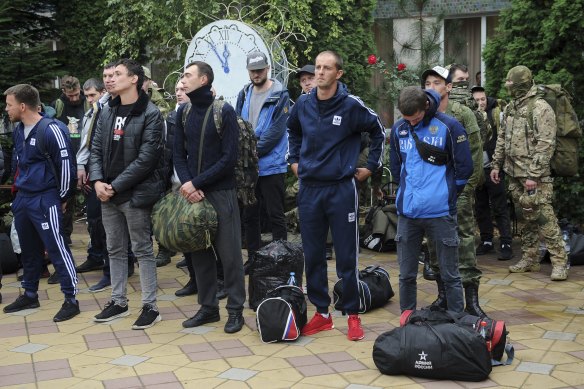 Russian recruits gather outside a military recruitment centre of Bataysk, Rostov-on-Don region, in the south of Russia.