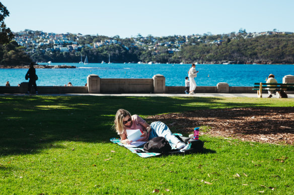 People enjoy a warm and sunny Sunday at Balmoral Beach in Mosman.