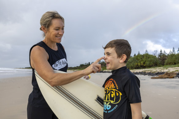 Emma Le Sueur, from Lennox Head, applying sunscreen lotion on son Jaxon. 