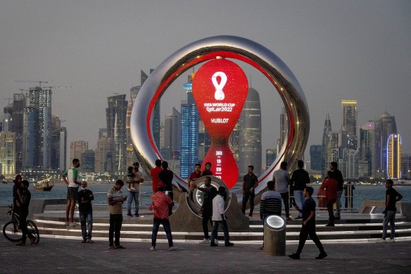 A countdown clock showing remaining time until the World Cup kick-off in Doha.
