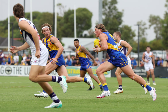 After a quiet start to the match, Harley Reid breaks clear of a pack for the West Coast Eagles.