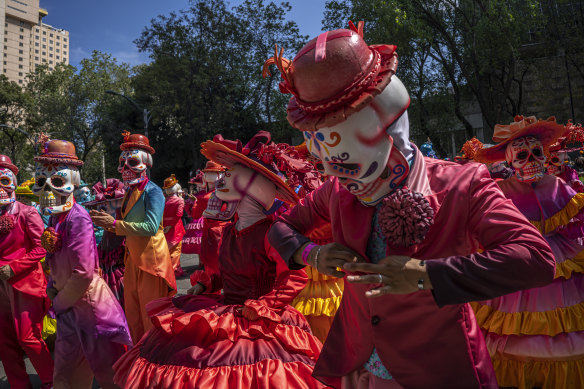 The Day of The Dead parade returned to Mexico City after being forced online last year due to the pandemic.