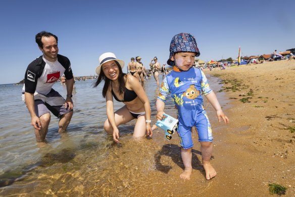 Ella Zhao, Paolo Palermo Patera and their two-year-old boy Francesco enjoying the water on Saturday. 