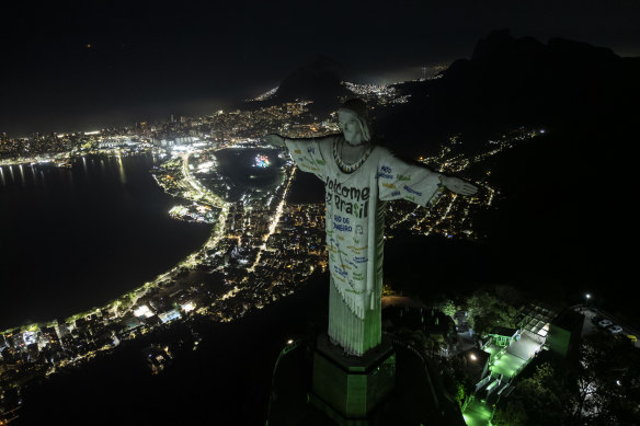 The Christ the Redeemer statue is illuminated with a welcome message for Taylor Swift, in Rio de Janeiro, Brazil, on November 16.