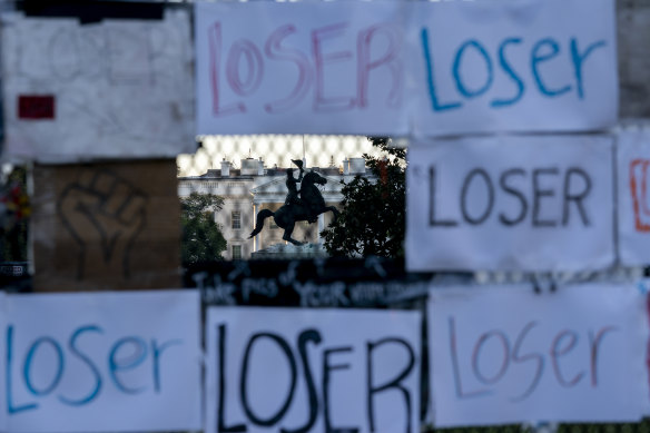 Telling it like it is: Signs on a fence in front of the White House after the November 3 election. 