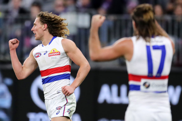 Bulldogs spearhead Aaron Naughton celebrates a goal against the Dockers at Optus Stadium.