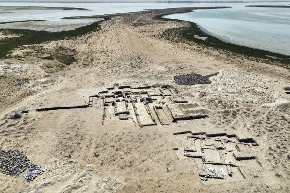 Ruins of a church, centre left, form part of the monastery complex uncovered on Siniyah Island in Umm al-Quwain, UAE.