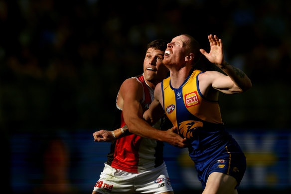 Bailey J. Williams of the Eagles contests a ruck with Rowan Marshall of the Saints.