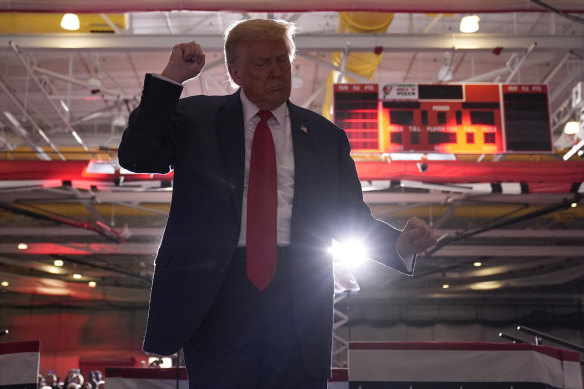 Republican presidential nominee former president Donald Trump dances at a campaign event at the Ryder Centre at Saginaw Valley State University in Michigan.