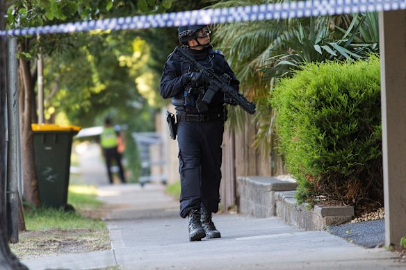 Police at the scene of an alleged home invasion in St Kilda.