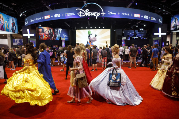 Princess for a day? Fans in cosplay at Disney’s D23 Expo.
