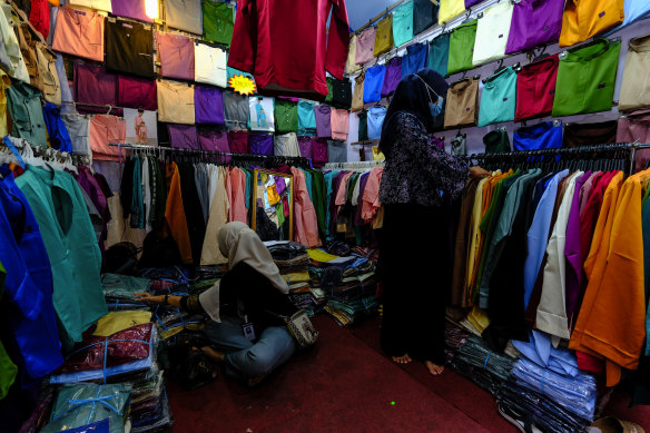 Shops were open in Malaysia during Ramadan but restrictions were ramped up at the end of the month. 