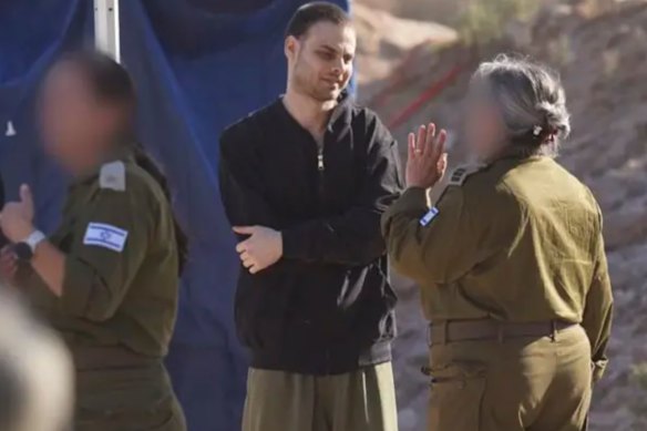 Released hostage Alon Ohel with Israeli forces following his release.