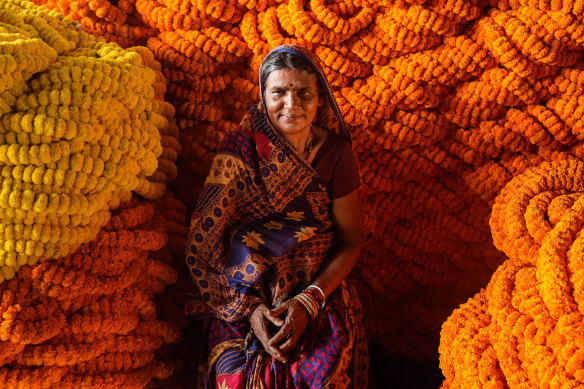 A seller at Kolkata’s famed flower market.