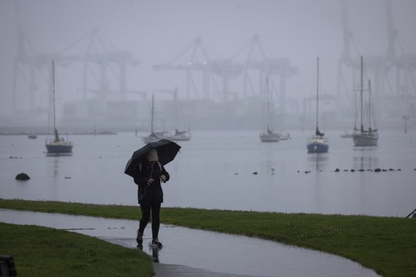 Braving the rain in Williamstown on Monday morning.