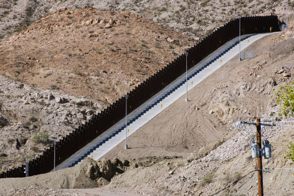 A section of a crowdfunded US-Mexico border wall in Sunland Park, New Mexico. We Build the Wall raised $US25 million to build its own private barrier, but was issued with a temporary restraining order by South Texas State District Judge Keno Vasquez in October.