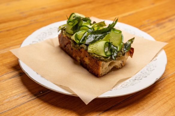 Nigella seed focaccia with bkeila, cucumber and fried curry leaf.