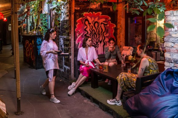 Emilia Bulatetska, second from left, with her friends Maryna Volzhyna, right and Maryna Vakoliuk in Kyiv, Ukraine.