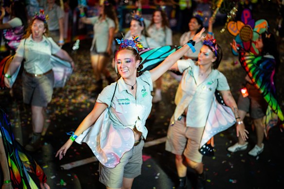 Donned with butterfly wings, Taronga Zoo staff members sparkle bright at this year’s Mardi Gras.