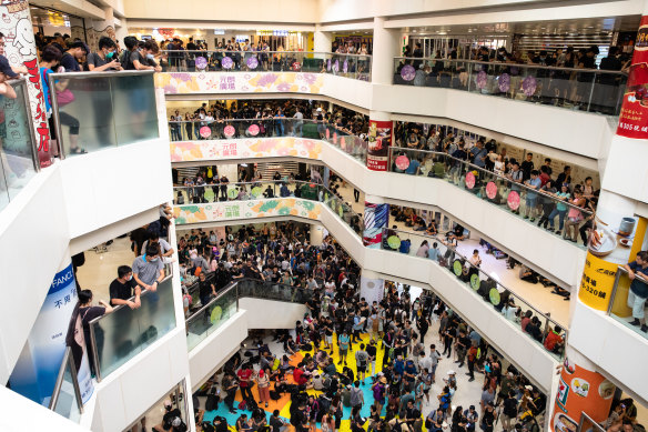 Demonstrators gather at Yuen Long Plaza during a protest in the Yuen Long district of New Territories, Hong Kong, China, on Saturday.