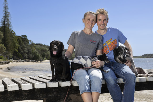 Stu and Janell Clarke with their three dogs (from left) Azra, Shadow and Weeti.