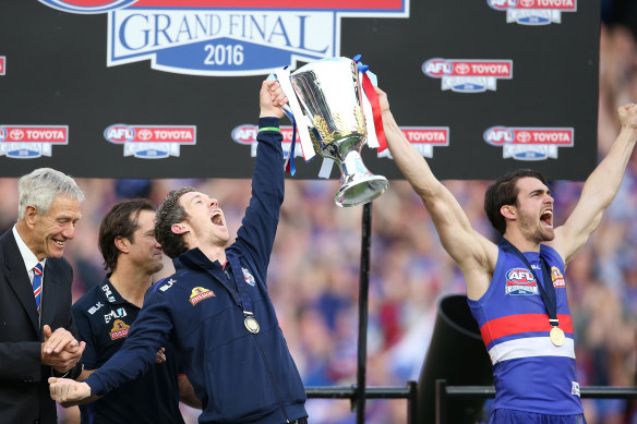 Easton Wood and Robert Murphy celebrate with the 2016 AFL Premiership Cup.