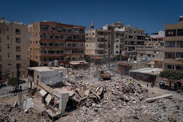 The aftermath of an Israeli airstrike where 30 people died in Tyre, Lebanon. 
