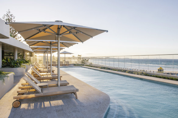 The third-floor pool deck provides uninterrupted views over the sea.