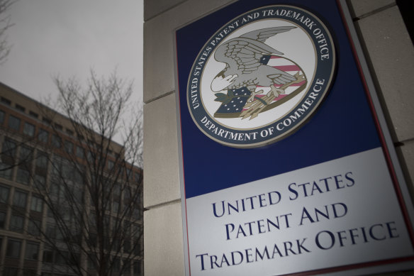 The United States Patent and Trademark Office (USPTO) seal is displayed in front of its headquarters in Alexandria, Virginia. Foreign-born inventors are directly behind nearly a quarter of all US patents.