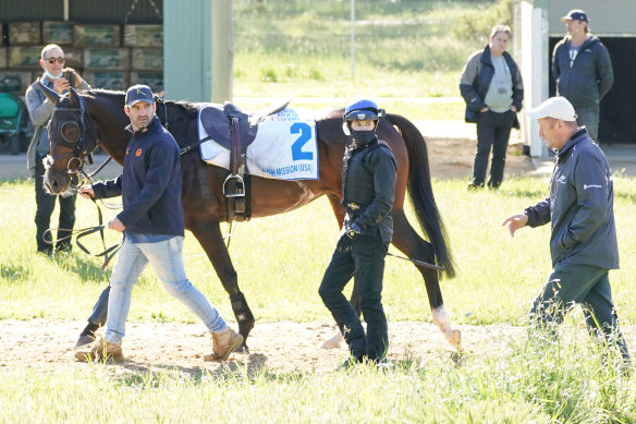 Craig Williams jumps aboard Spanish Mission at Werribee on Sunday.