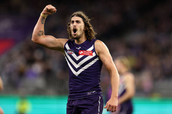 Fremantle big man Luke Jackson celebrates a goal against Essendon.