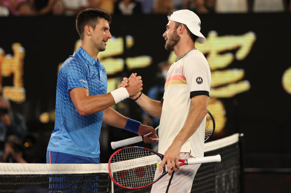 Novak Djokovic and Tommy Paul after the match.