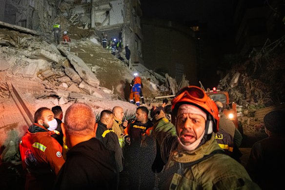 Rescue workers in Beirut search the rubble for survivors and the injured after an Israeli attack on Wednesday.